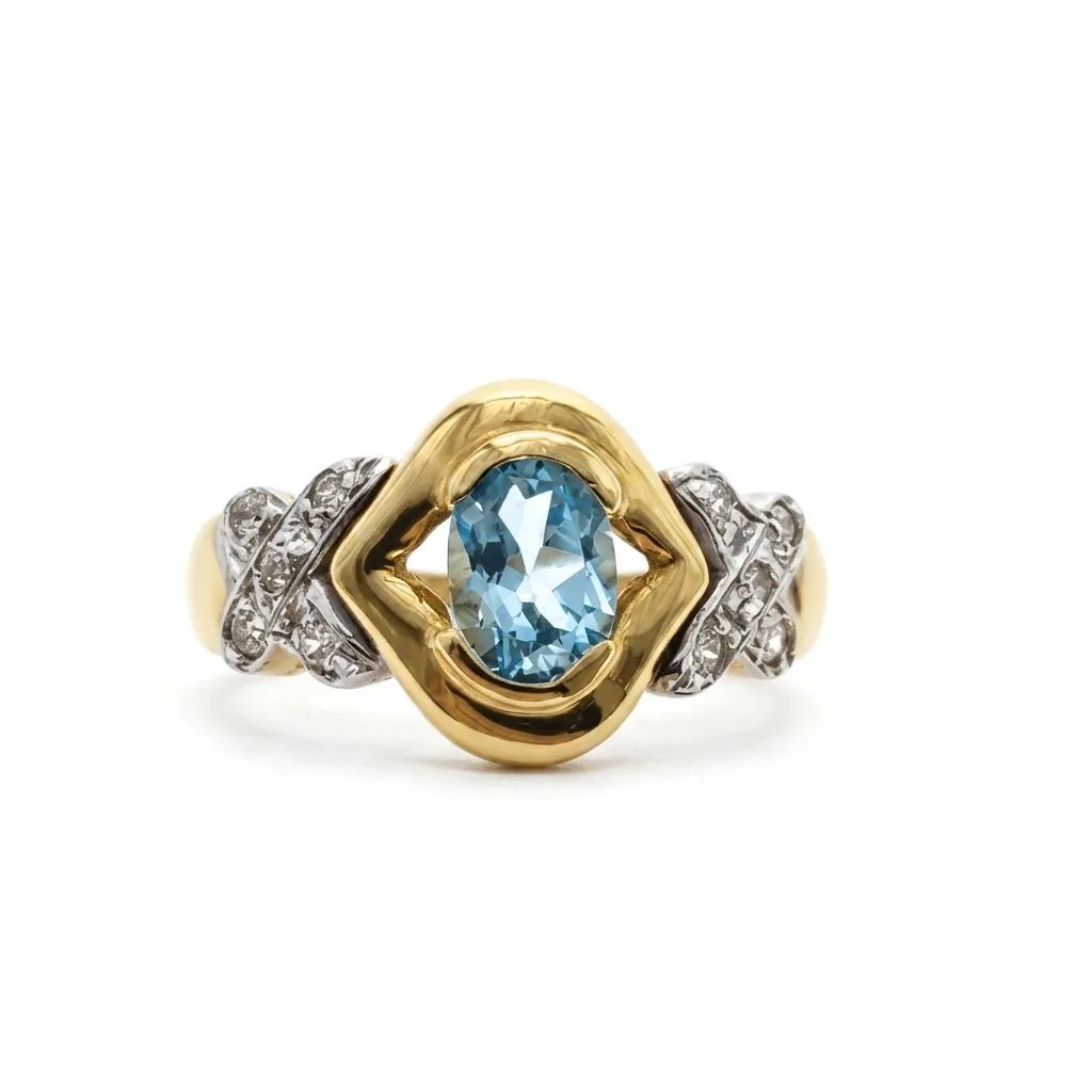 Oval Blue Topaz & Cubic Zirconia Ring in 18ct Gold