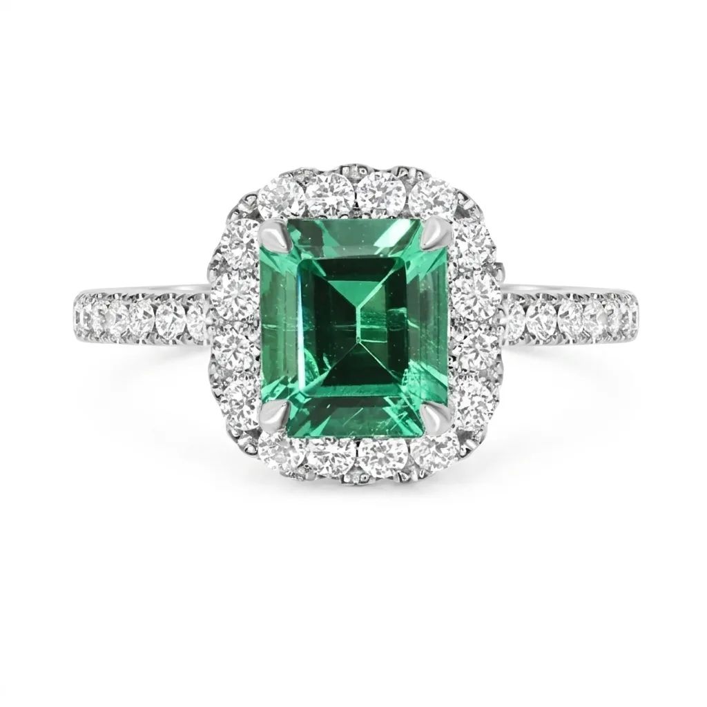 Emerald & Diamond Halo Engagement Ring in 950 Platinum
