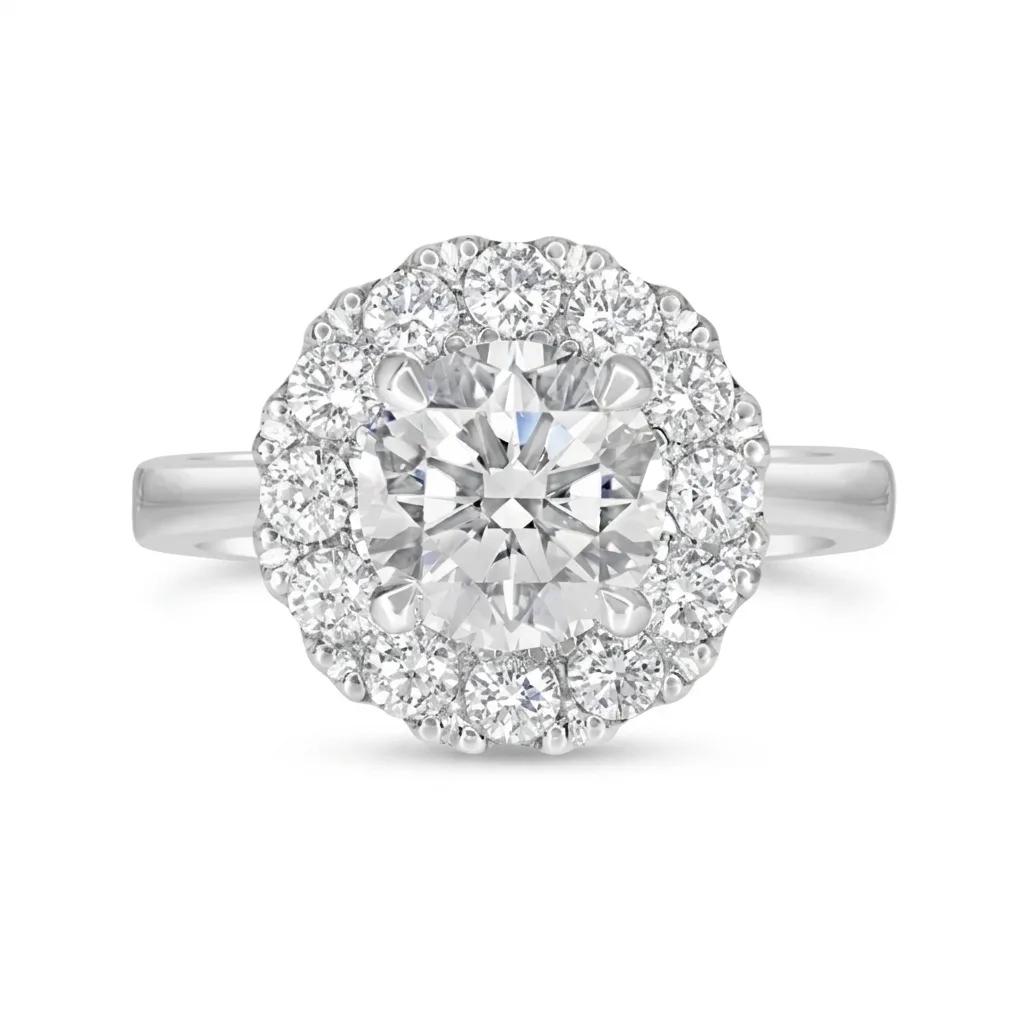 Halo Engagement Ring in 950 Platinum & Diamonds