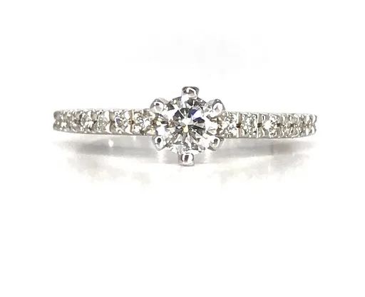 Claw Solitaire Engagement Ring with Cutout Hearts in 18ct White Gold
