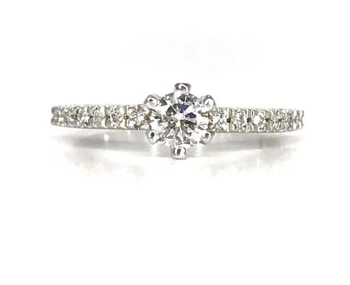 Claw Solitaire Engagement Ring with Cutout Hearts in 18ct White Gold